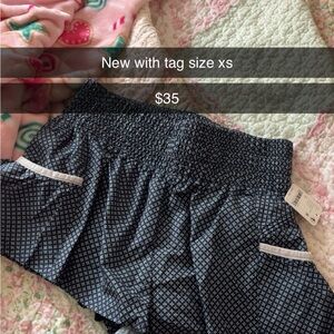 FP Movement by Free People Navy Blue & White Patterned Skirted Shorts